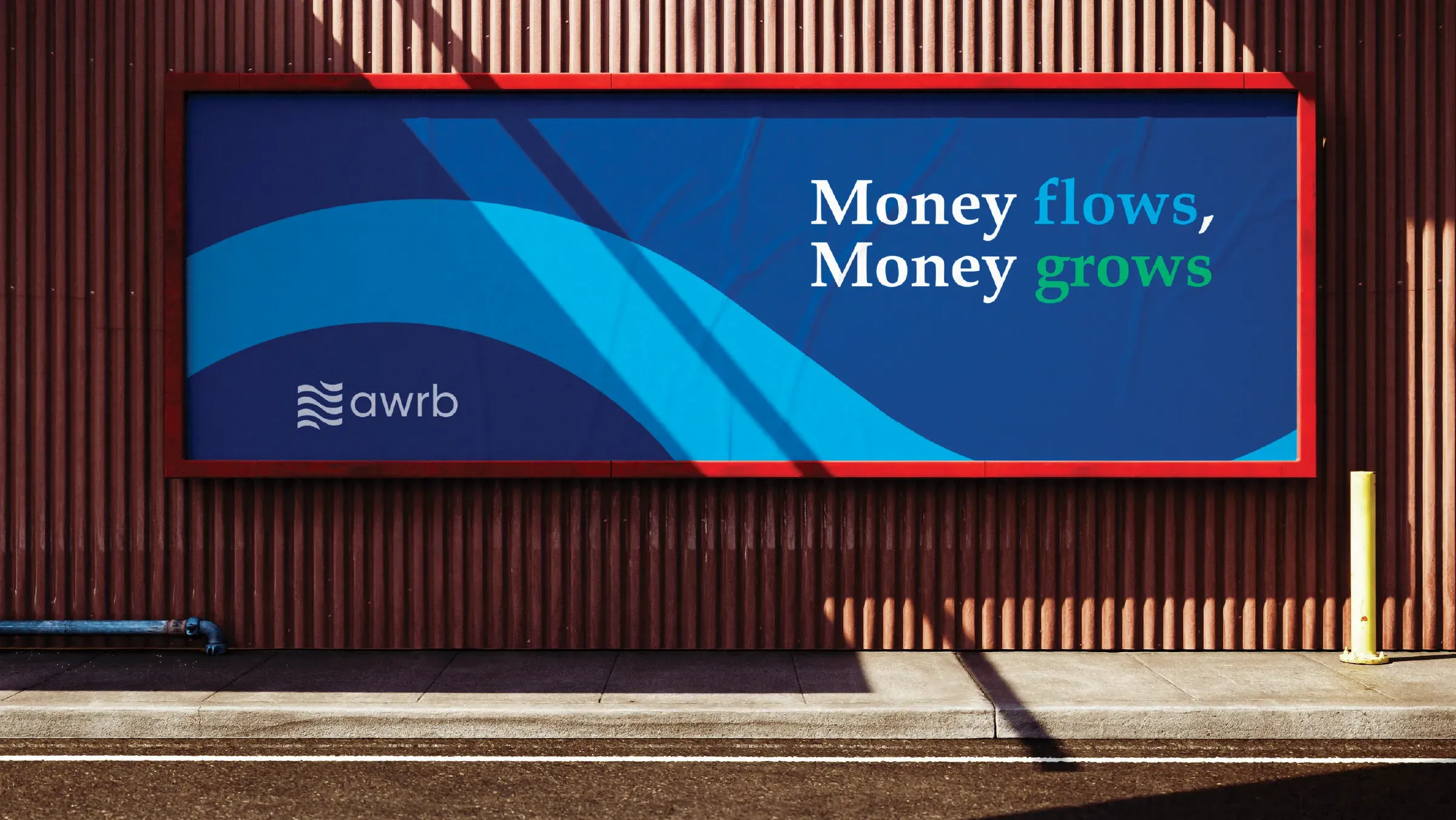 Roadside billboard reading Money flows, Money grows in the Ankobra wave graphic.