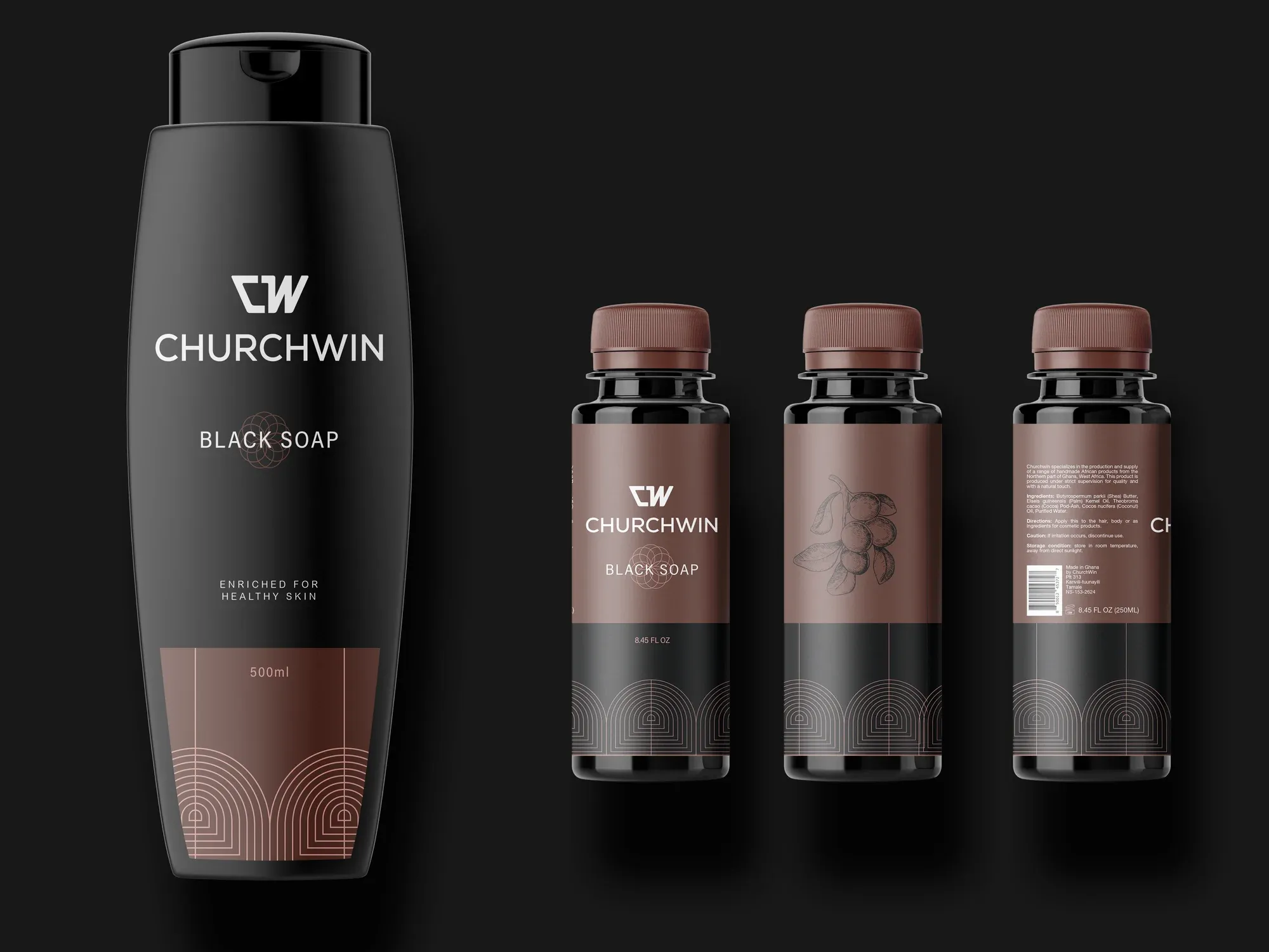 A tall black soap bottle beside three smaller amber bottles, shot on black.