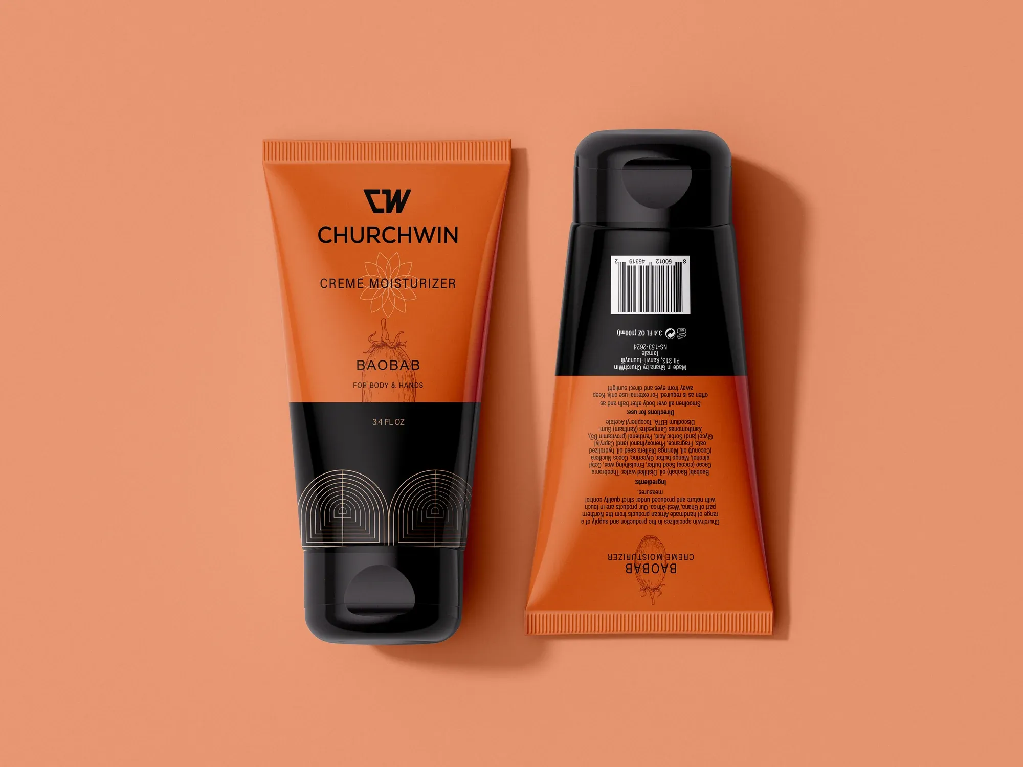 Front and back of a baobab crème moisturiser tube, laid on a warm coral field.