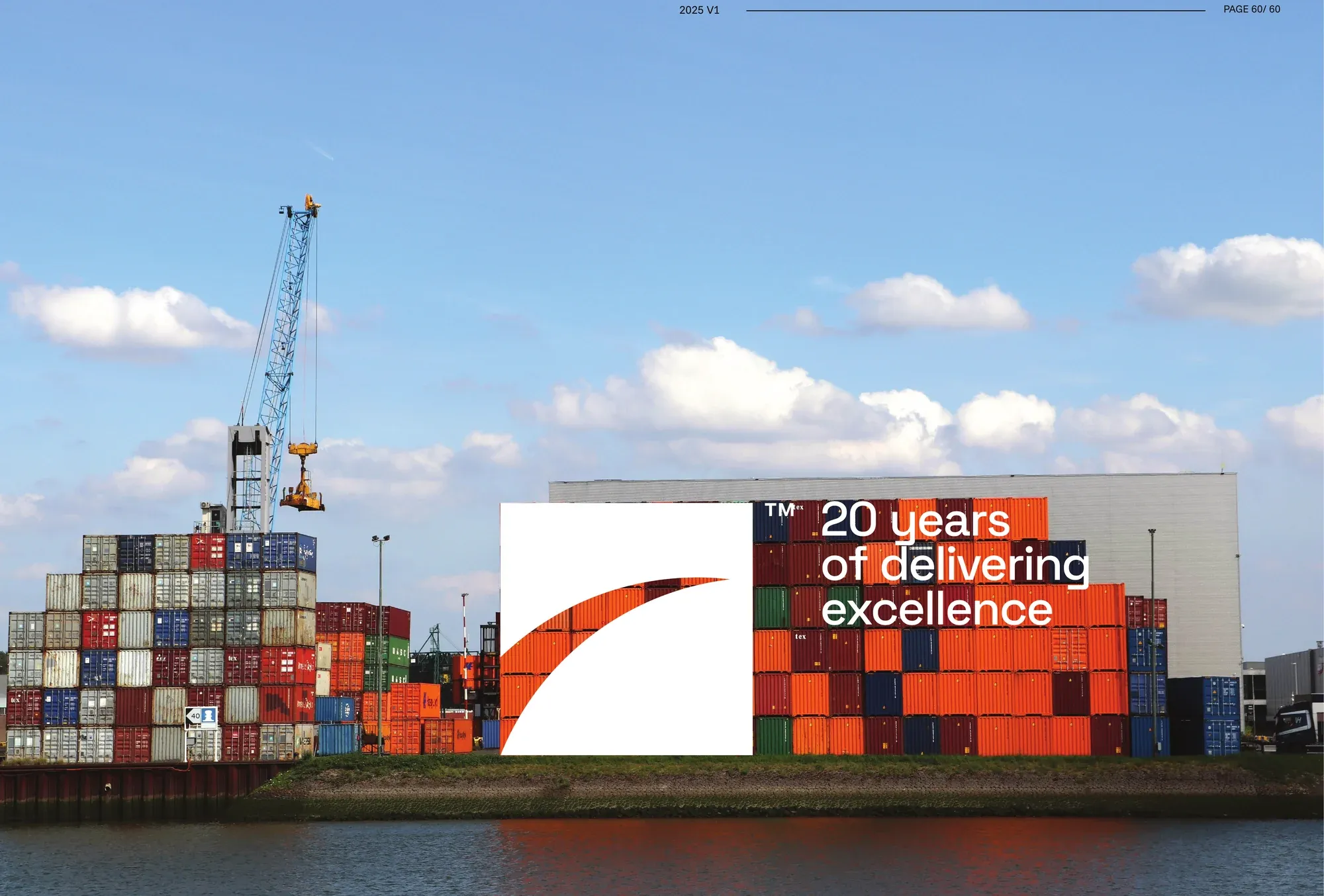 A container-yard hoarding reading twenty years of delivering excellence, against stacked shipping containers.