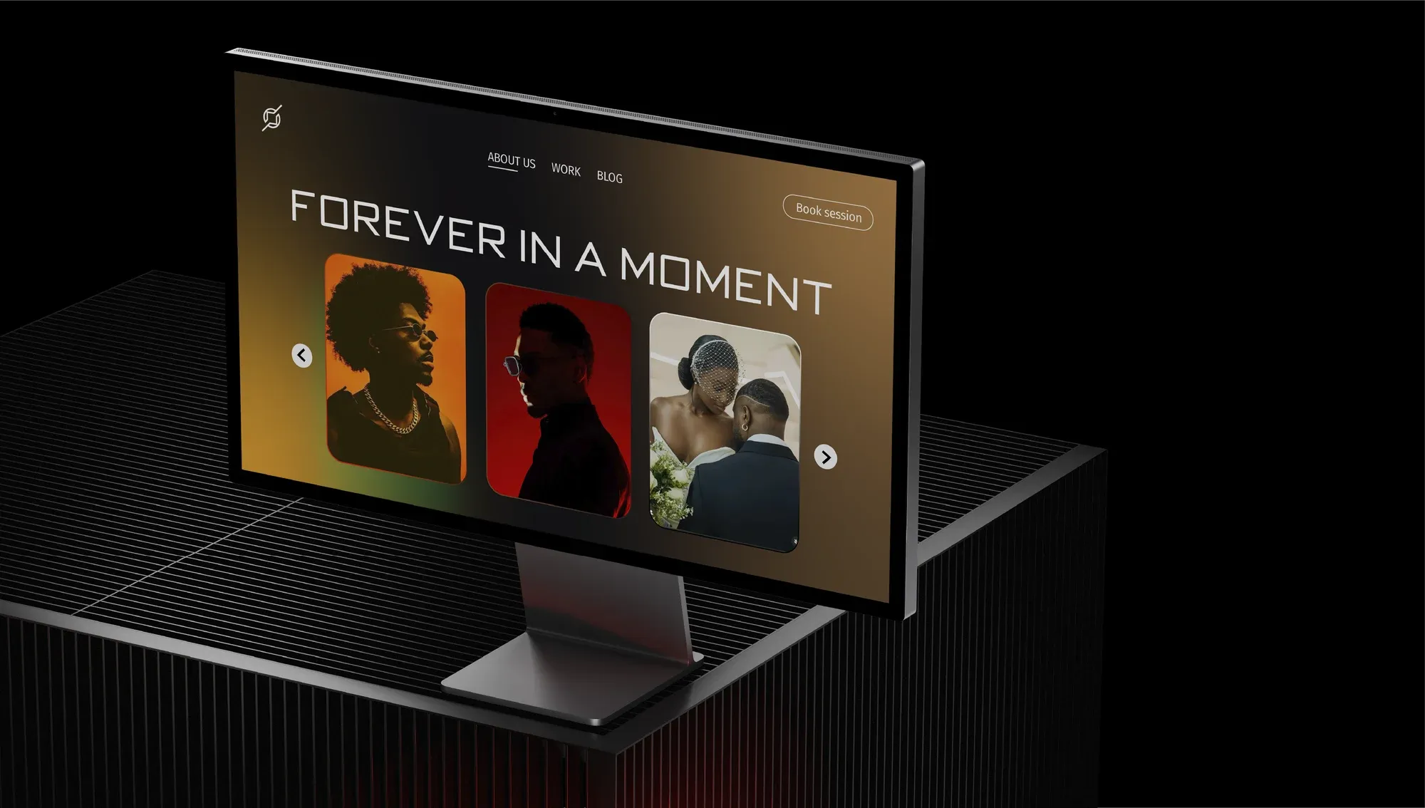 A website on a monitor, a gallery of portraits running under the headline forever in a moment.
